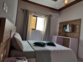 Chambre de luxe chez FOUR IN ONE Résidence